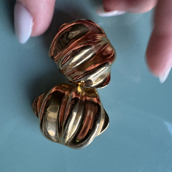 Large gold tone clip on vintage earrings